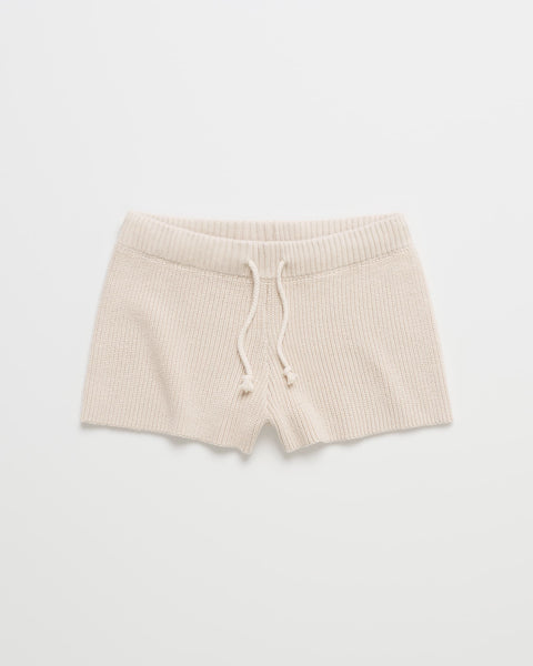 The ROXY x Madhappy Rib Mini Short in Birch features a ribbed elastic waistband and a front drawstring, crafted from luxuriously soft ribbed stretch fabric—an absolute lounge essential, laid flat on a white background.