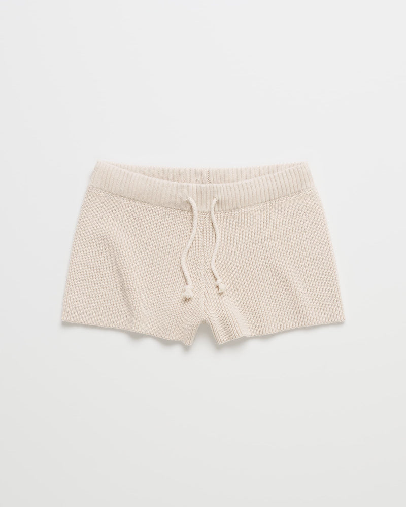 The ROXY x Madhappy Rib Mini Short in Birch features a ribbed elastic waistband and a front drawstring, crafted from luxuriously soft ribbed stretch fabric—an absolute lounge essential, laid flat on a white background.