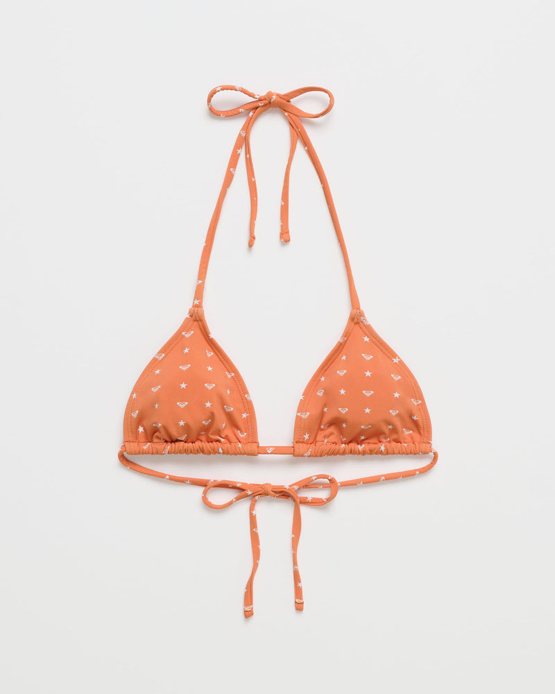 Roxy x Madhappy Mini Tiki Triangle Bikini Top in Apricot Spice, featuring small white printed designs and halter neck and back ties, displayed on a plain white background.