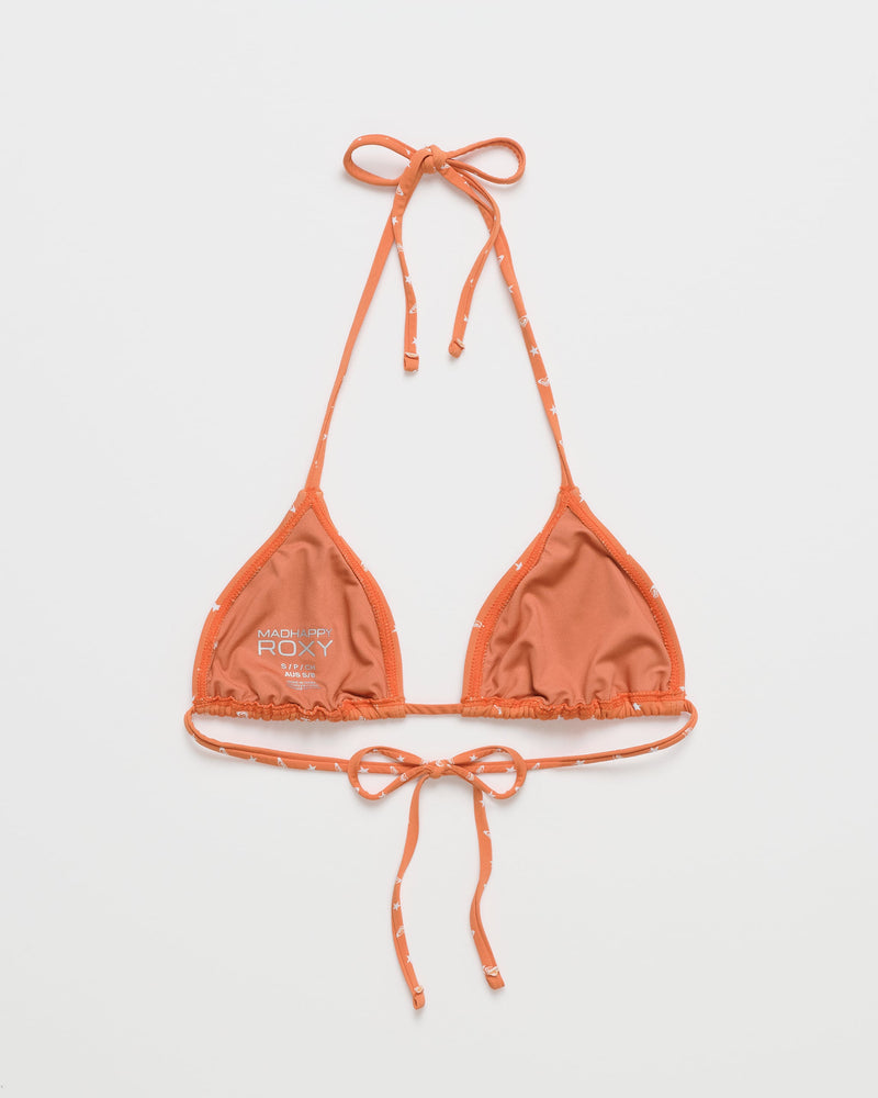 The Roxy x Madhappy Mini Tiki Triangle Bikini Top features an apricot spice orange color with thin straps for neck and back tie, and a small white Roxy logo on the left cup. This piece from the Roxy brand’s collaboration with Madhappy is displayed on a white background.