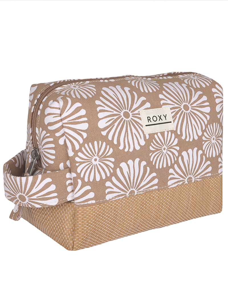 The Misty Jetties Travel Accessories Pouch by Roxy is a beige, rectangular cotton pouch with a white floral print, top zipper, side handle, front ROXY label, and a darker woven-texture base for added style and function.