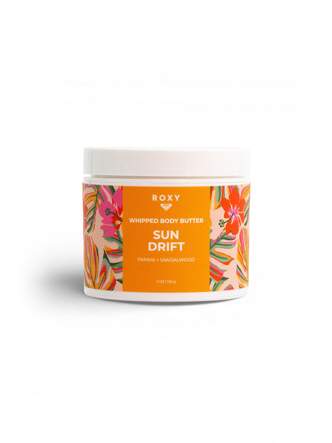 Roxy Sun Drift Body Butter, infused with papaya and sandalwood, hydrates dry skin. The 5 oz (142 g) jar features tropical orange and floral designs on white for a refreshing daily skincare experience.