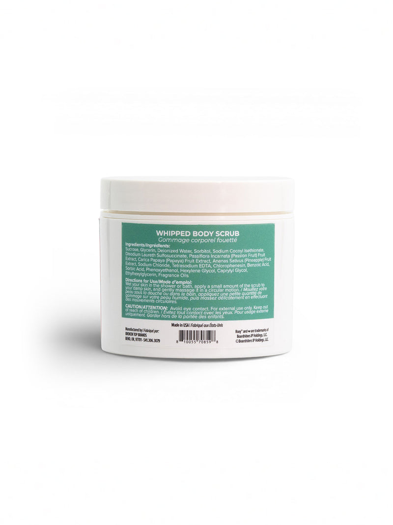 A white jar of Roxy Hibiscus Wave Body Scrub with a green label detailing ingredients is displayed on a plain white background. The exfoliating formula, perfect for shower routines, is highlighted on the back label.