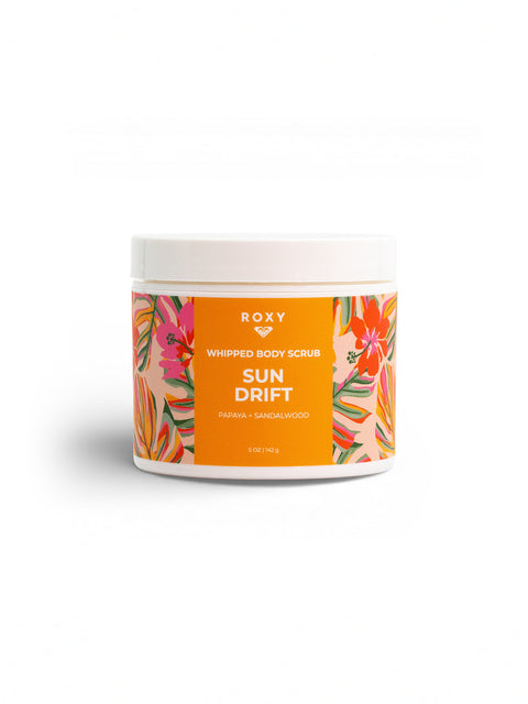 The Roxy Sun Drift Body Scrub comes in a round container with an orange label and vibrant tropical designs, featuring papaya and sandalwood—perfect for exfoliating and self-care.