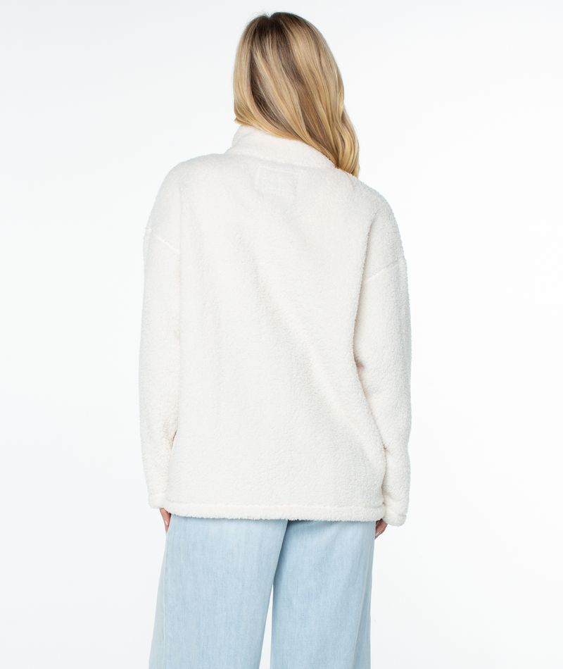 Back view of a Roxy Cozy Day Fleece Top in cream, featuring a longline, fuzzy fleece design with a cozy mock neck.