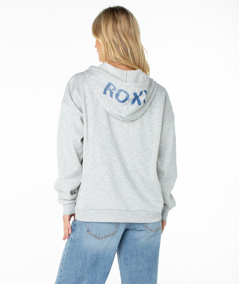 A blonde woman, shown from the back against a plain white background, wears the ROXY Sundown Zip Hoodie in buttery soft light gray with blue jeans.