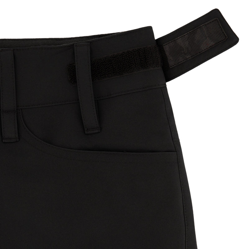 Close-up of the waistband on Roxy Girls' Backyard Pant snow pants, showing an adjustable hook-and-loop strap, front pocket, belt loops, and visible stitching detail.
