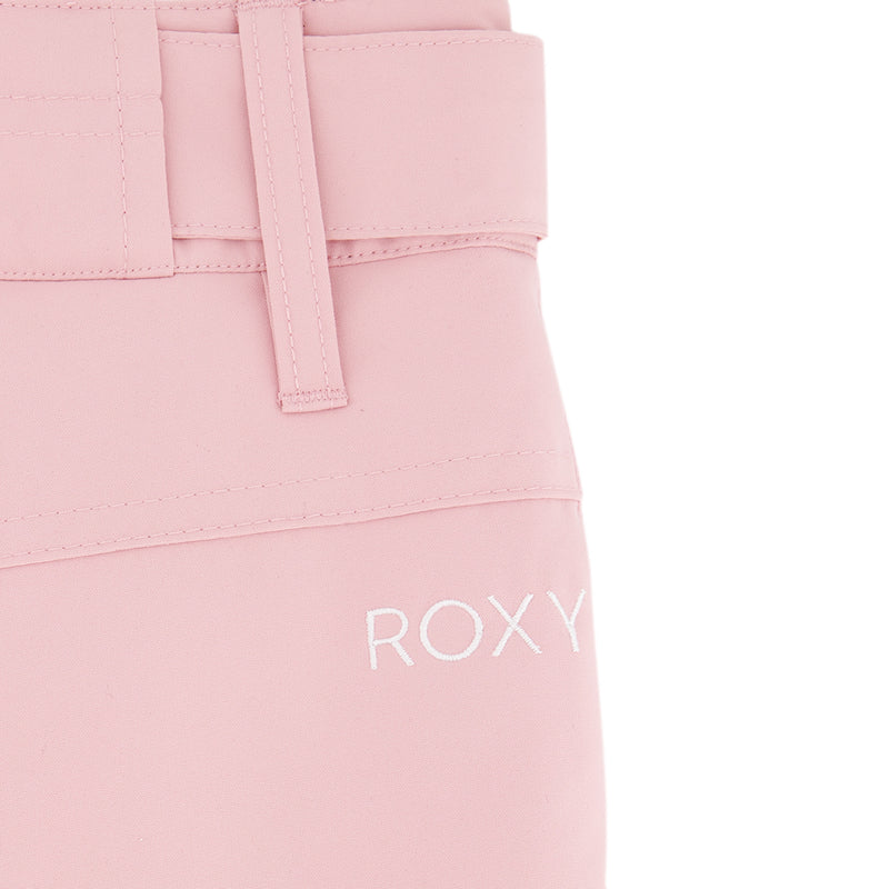 Close-up of light pink Girls' Backyard Pant by Roxy, featuring a stitched belt and "ROXY" embroidered in white near the bottom right corner.