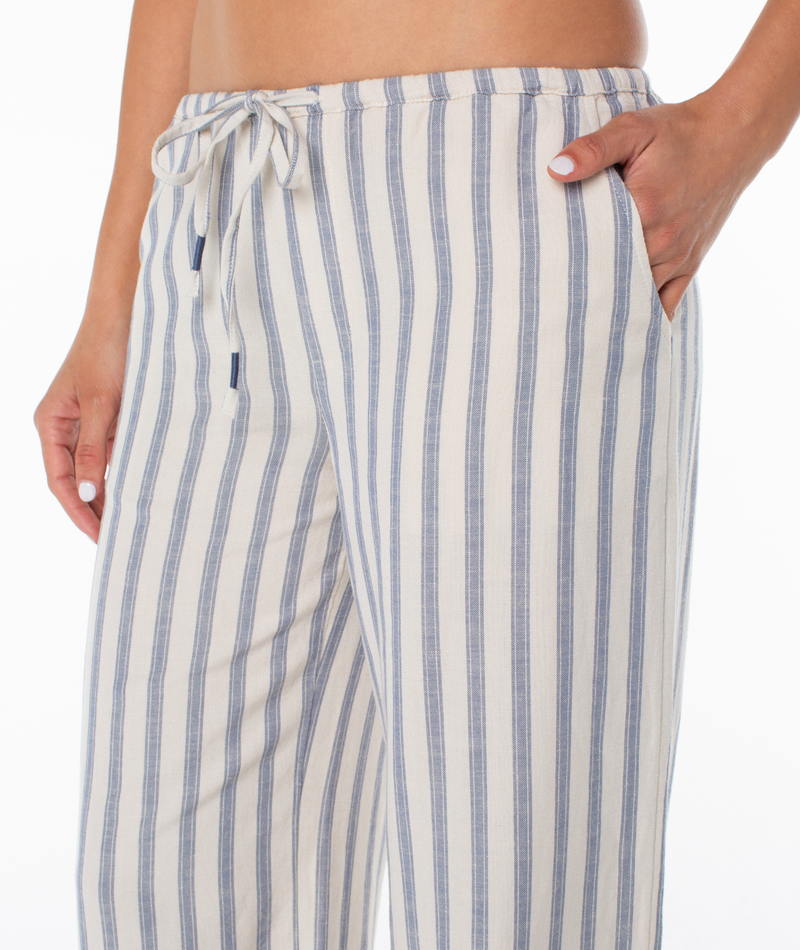 Relaxed-fit, light-colored, wide-leg Iyla Pant 2 coastal pants featuring vertical blue stripes, a drawstring waist, and side pockets.