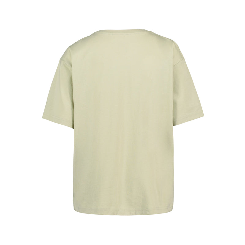 The Roxy Girls' Coastal Oversized Tee is pictured from the back in light beige, crafted from soft cotton jersey and set against a white background.