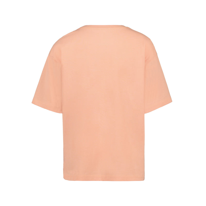 The Roxy Girls' Sunshine Oversized Tee, shown from the back against a white background, features a light peach color and relaxed fit in soft cotton jersey.