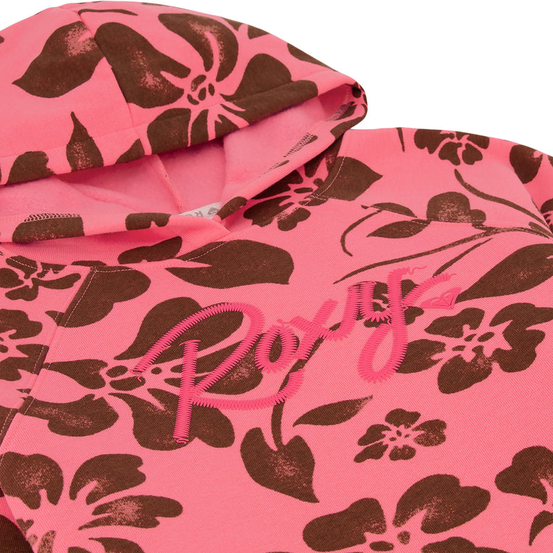 The Roxy Girls' Floral Swell Hoodie features pink fabric with brown floral prints, “Roxy” embroidered on the front, visible stitching, a hood, and is made of soft cotton-poly fleece for cozy all-day comfort.