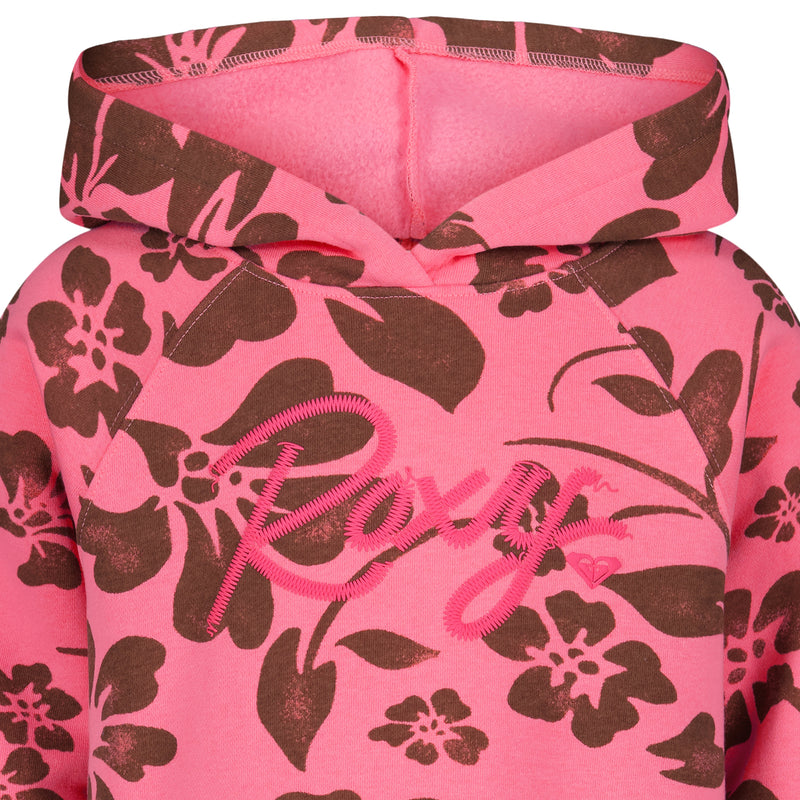 A close-up of the Roxy Girls' Floral Swell Hoodie, featuring brown floral prints and "Roxy" in pink script on the chest. Made from soft cotton-poly fleece with a visible hood at the top.