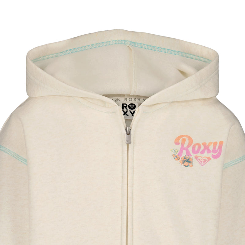 Close-up of the Roxy Little Girls' Coastal Cruiser Zip Hoodie in cream soft cotton-poly fleece, featuring a pink and orange Roxy logo with a floral graphic on the left chest and light blue seam stitching.