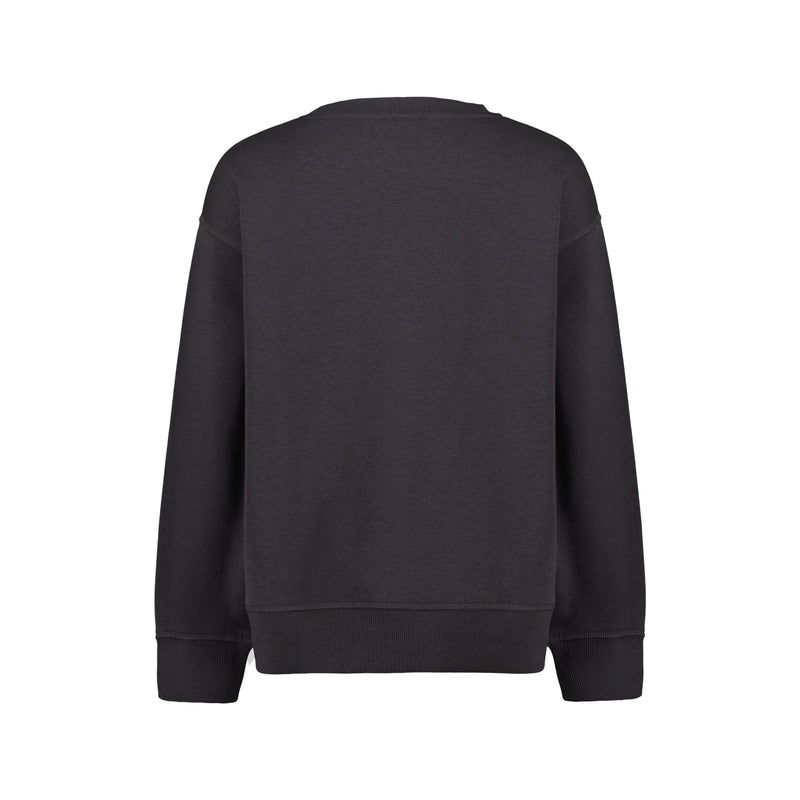The Roxy Girls' Sunny Crew is an oversized black sweatshirt with long sleeves and a crew neckline, made from soft cotton-poly fleece pullover fabric. Shown from the back against a white background.