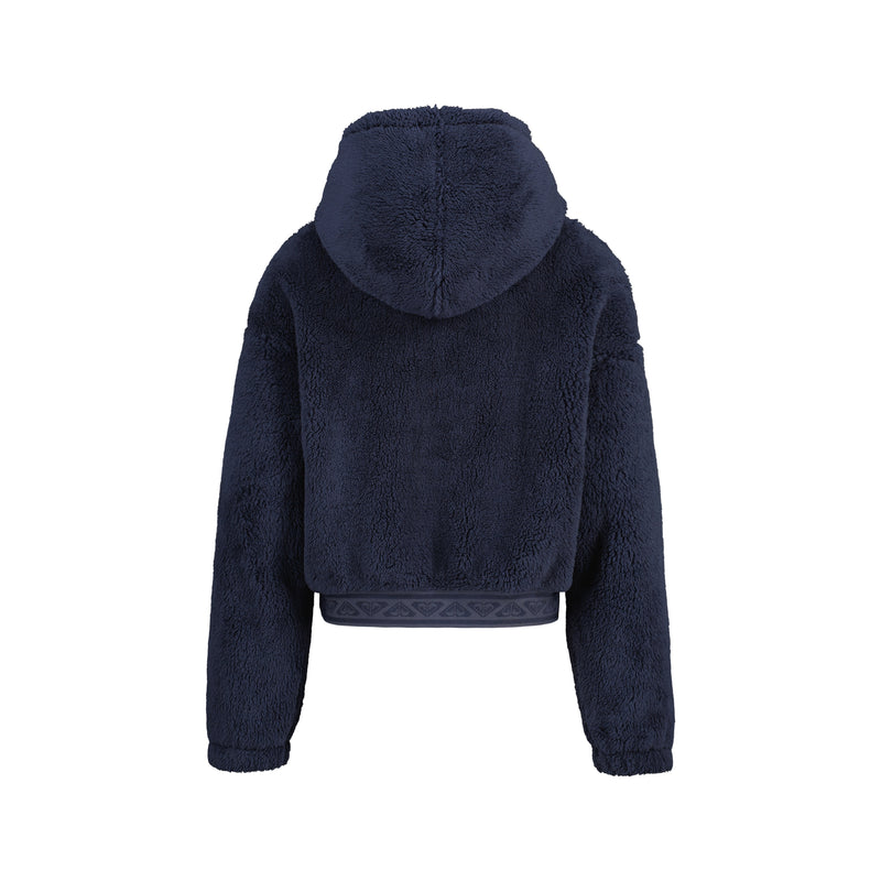 Back view of a navy blue Roxy Girls’ Minky Hoodie with a textured, fuzzy fleece finish and a branded elastic hem.