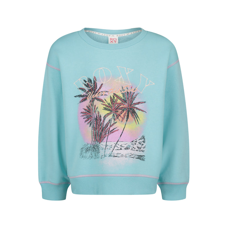 Light blue Girls’ Have A Swell Day Crew sweatshirt by Roxy featuring a graphic of palm trees in front of a circular sunset.