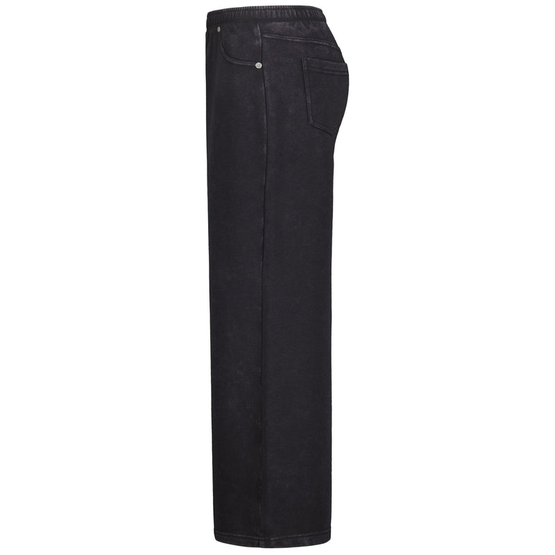 Side view of the Roxy Girls' Jump Start Jogger, a pair of black cotton fleece wide leg pants featuring an elastic waist, front pocket, and a simple classic design.