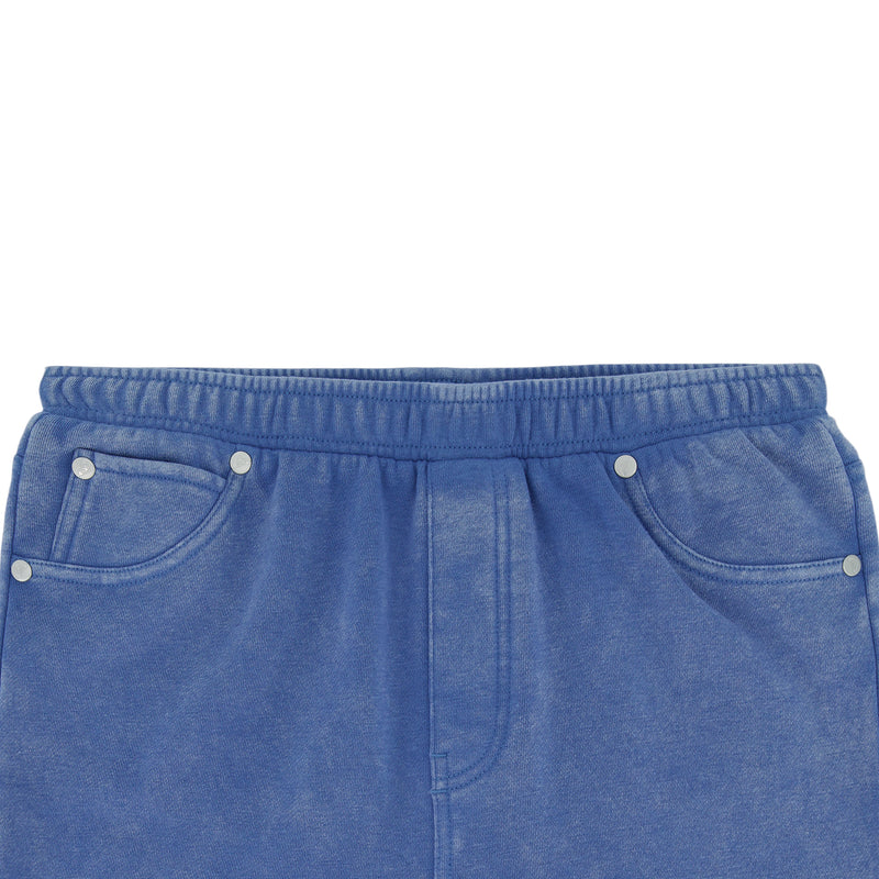 Close-up of the elastic waistband and upper part of Roxy Girls' Jump Start Jogger in blue, crafted from soft cotton-poly fleece with visible stitching, silver rivets, and side pockets—ideal for fans of wide leg pants.