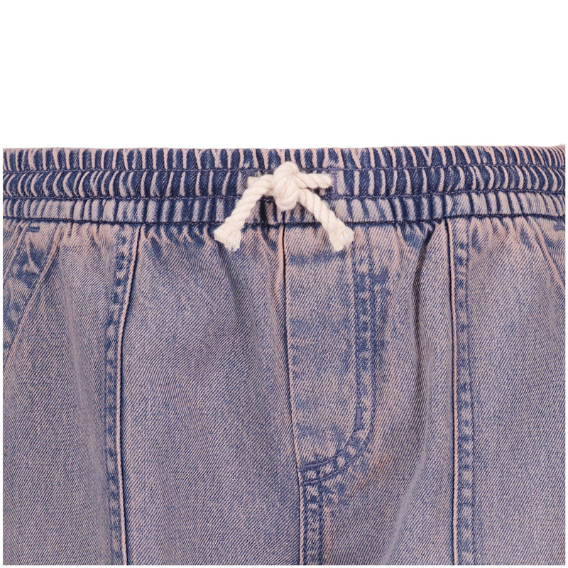 Close-up of the Roxy Girls' Denim Himalayan Pant, featuring an elastic waistband with a white drawstring and visible stitching—perfect for effortless, pull-on comfort.