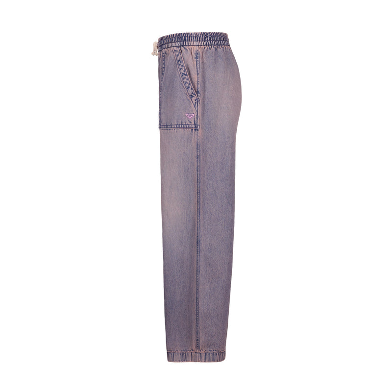 Side view of Roxy Girls' Denim Himalayan Pant in light purple, featuring an elastic waistband, drawstring, visible front pocket, and relaxed fit, displayed on a white background.