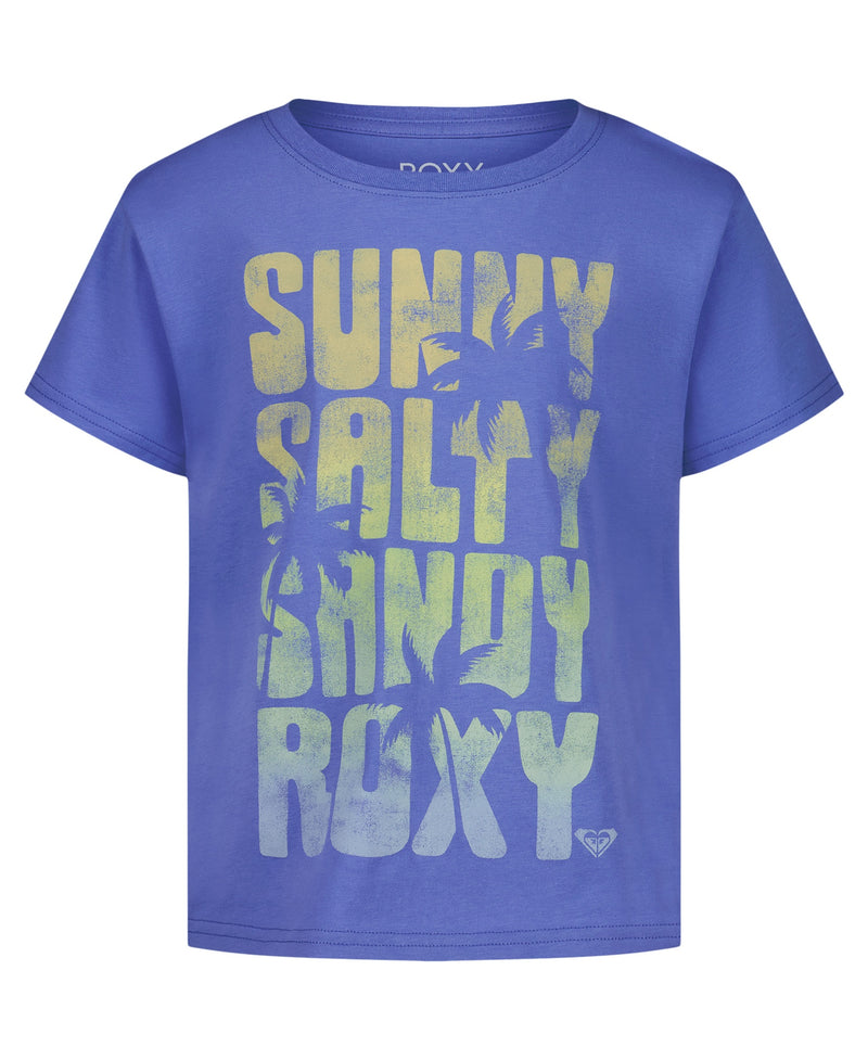 The Roxy Girls' Sunny Salty Sandy Tee is a blue short sleeve cotton crewneck with palm tree graphics and large faded yellow and white "SUNNY SALTY SANDY ROXY" lettering—perfect for sunny days.