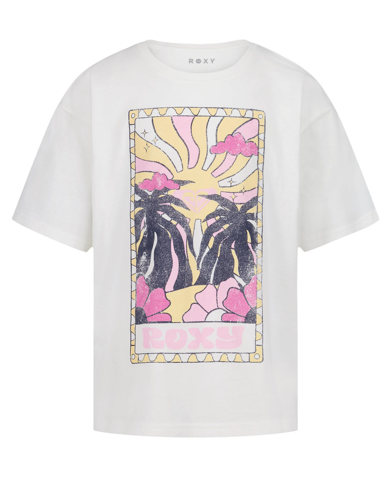 The Girls' Sun-Kissed Oversized Tee by Roxy features a vibrant front graphic of palm trees, pink clouds, a yellow sunburst, and flowers. Made from soft cotton jersey, it has "ROXY" in pastel colors at the bottom.