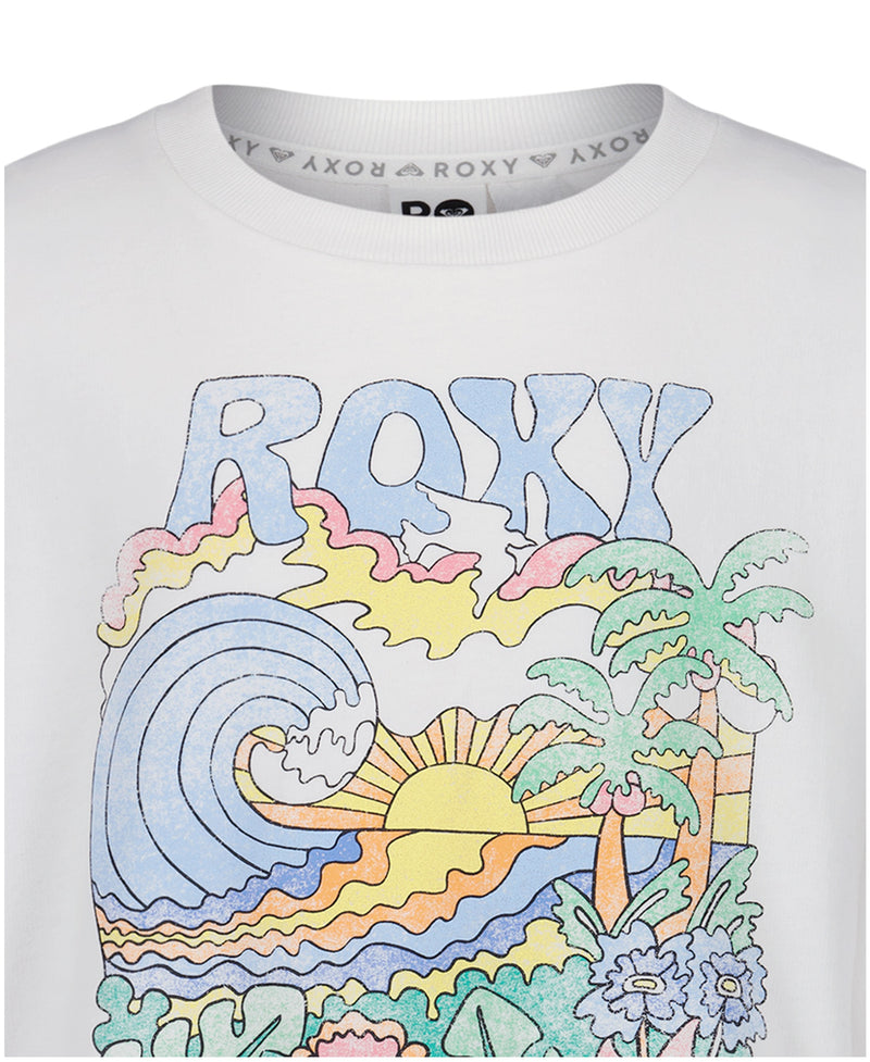 A close-up of the Roxy Girls' Nature Oversized Crewneck Sweatshirt, featuring a colorful cartoon-style beach scene with waves, a sunset, palm trees, flowers, and the word "ROXY" above the print.
