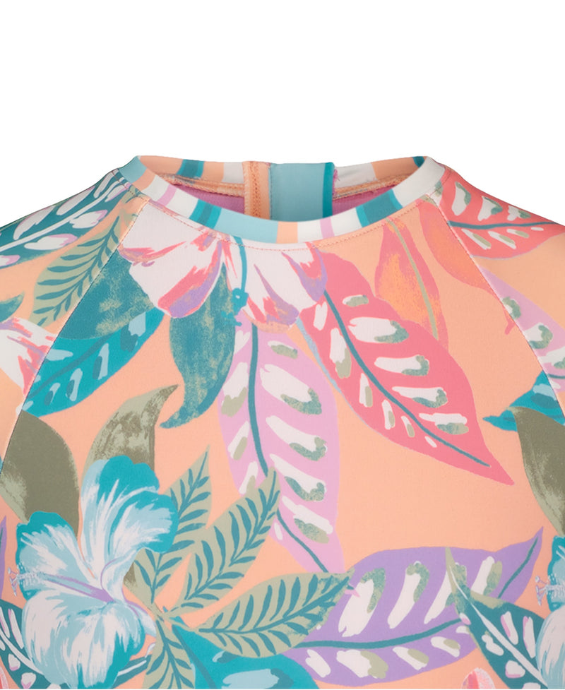 Close-up of the Roxy Girls' Hot Tropics Onesie, a one-piece swimsuit with a high neckline, vibrant pink, coral, green, blue and white tropical floral pattern, visible stitching, and a partial back zipper.
