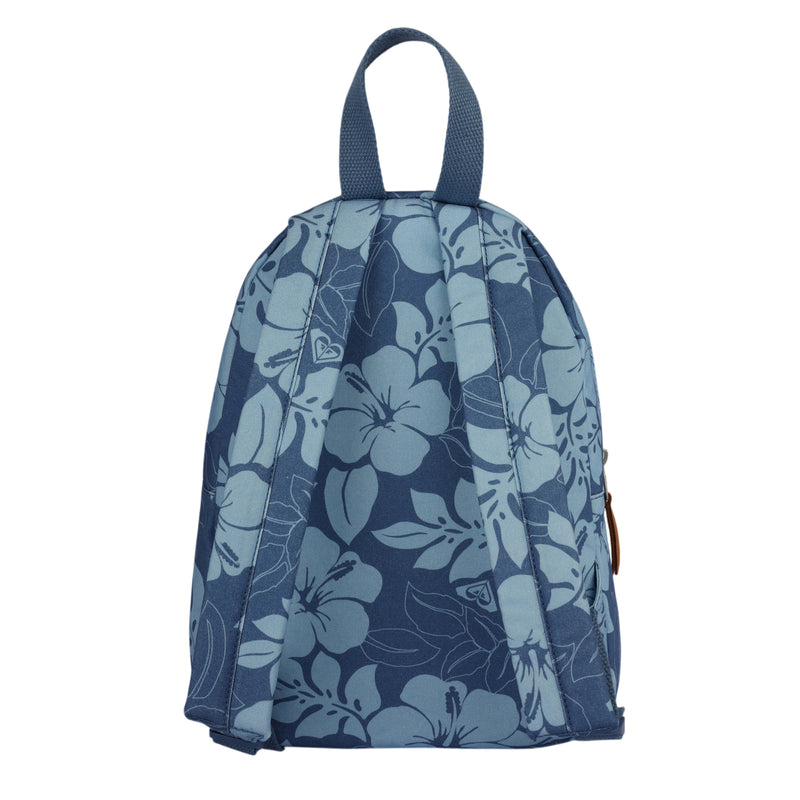 The Roxy Always Core Canvas Backpack is shown standing upright with the back side visible. This small blue backpack features light blue floral patterns and adjustable shoulder straps.
