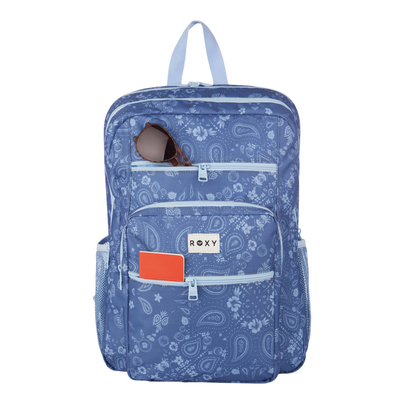 The Roxy Campus Crush Backpack showcases a blue patterned design made from recycled polyester, complete with a signature Roxy label. It features organizer pockets, including two front zip compartments—ideal for keeping sunglasses in the upper pocket and an orange notebook in the lower one. The light blue handle and side mesh pockets are visible, while a padded laptop sleeve ensures added protection for your tech.