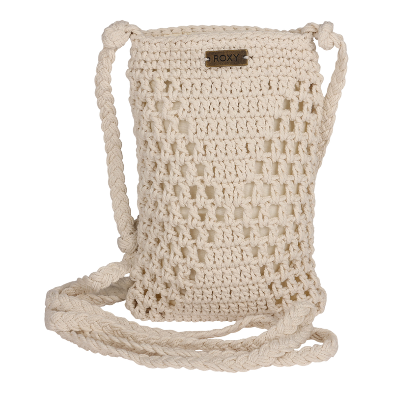 Introducing the Chips And Guac Phone Bag by Roxy—a small, cream-colored crocheted crossbody bag featuring a braided strap and a metal ROXY logo plate on the front. This stylish accessory is perfect for adding a chic touch to any outfit.