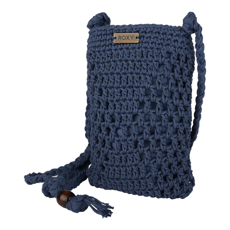 The Roxy Chips And Guac Phone Bag is a small navy blue crocheted crossbody featuring a braided strap, wooden bead accent, and metal ROXY logo on the front—perfect for adding a stylish touch to any outfit.