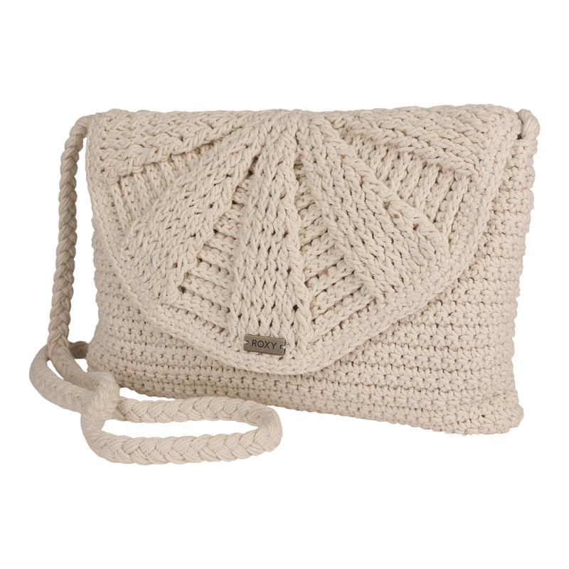 Introducing the Chips And Guac Medium Crossbody Bag by Roxy—a beige, crocheted crossbody featuring a braided strap and a flap closure adorned with a fan-inspired pattern. This everyday essential offers hands-free convenience and is finished with a small ROXY metal tag on the front.