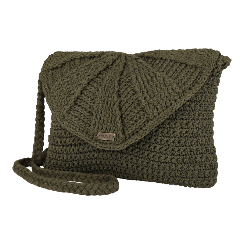 Introducing the Chips And Guac Medium Crossbody Bag by Roxy—a green, crocheted bag featuring a convenient flap closure, braided strap, and a small metal ROXY logo tag on the front. This stylish crossbody is an everyday essential for hands-free ease.