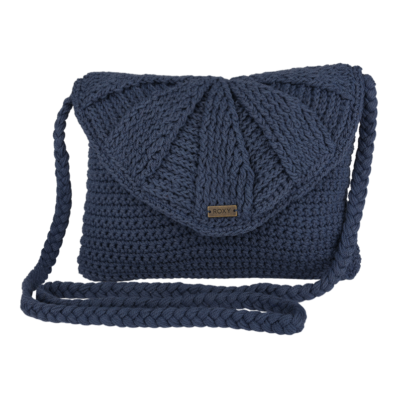 The Chips And Guac Medium Crossbody Bag by Roxy comes in a vintage indigo shade, featuring a textured crocheted flap, braided strap, and a small rectangular ROXY label on the front—an everyday essential designed for hands-free convenience.