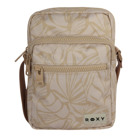 The ROXY Current Mood Crossbody Bag features a beige hue with an eye-catching leaf pattern, two zippered compartments on the front, and a small ROXY label at the bottom. It comes with a matching beige adjustable strap for comfortable wear.