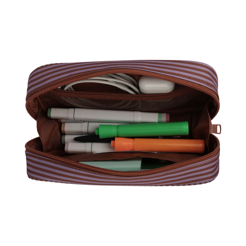 The Roxy Smarty Pack Supplies Organizer is an open brown and purple striped pencil case made from recycled polyester, featuring neatly organized school essentials like markers, a pen, a cable, and a small white object for easy access.