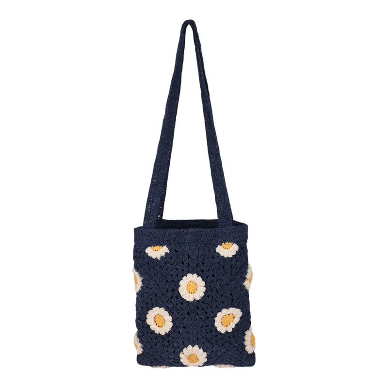The Wandering Beach Crochet Tote Bag by Roxy in Vintage Indigo features white and yellow daisy flower patterns, displayed on a plain white background. This lightweight tote bag is perfect for adding a charming, handmade touch to your everyday look.