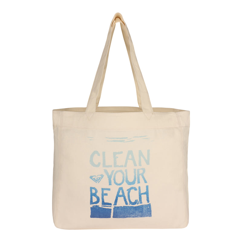Introducing the ROXY Clean Your Beach Tote Bag: a beige printed canvas tote featuring "CLEAN YOUR BEACH" in bold blue lettering on the front. This eco-friendly, rectangular tote comes with two sturdy handles, making it ideal for everyday use while promoting sustainability.