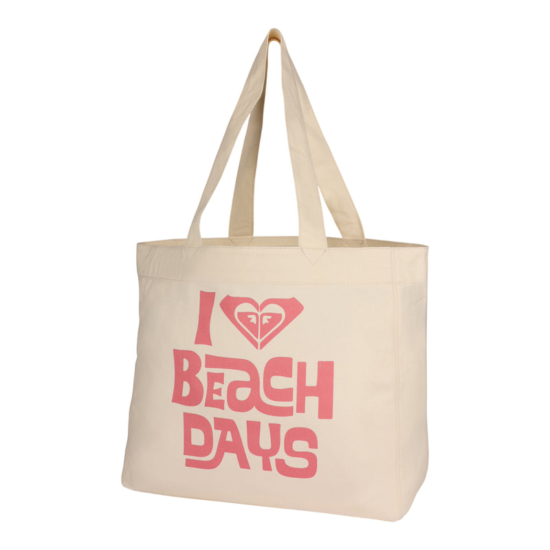 Introducing the ROXY Beach Days Tote Bag—a beige printed canvas tote with two comfortable handles. The front features the cheerful phrase "I ♥ BEACH DAYS" in vibrant pink lettering. This eco-friendly tote is perfect for carrying all your beach essentials.