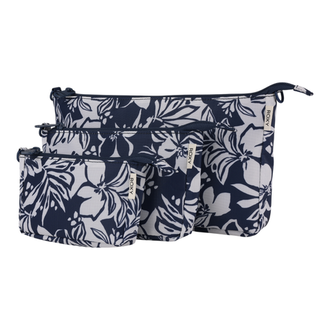 A trio of Roxy Travel Pouch Set organizers in the Oceanside color, featuring zippered closures and varying sizes, are artfully grouped and overlapping against a white background—ideal for stylish packing organization.