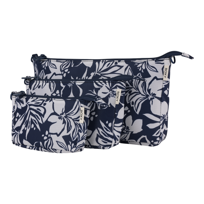 A trio of Roxy Travel Pouch Set organizers in the Oceanside color, featuring zippered closures and varying sizes, are artfully grouped and overlapping against a white background—ideal for stylish packing organization.