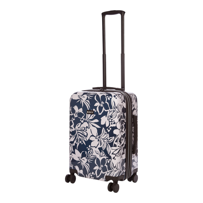 The Roxy Up And Away Hardside Spinner Carry-On Luggage in navy blue features white floral patterns, smooth spinner wheels, and an extended telescopic handle for effortless travel. This durable suitcase ensures reliable mobility wherever you go.