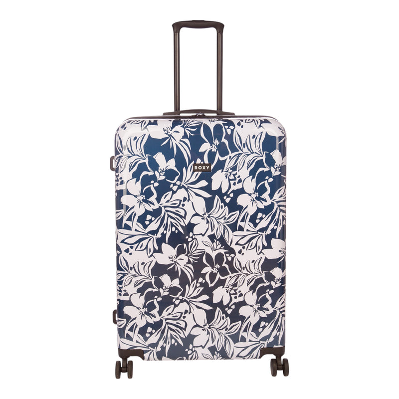 The Roxy Up And Away Hardside Spinner Large Luggage features a navy blue and white floral pattern, four durable spinner wheels, and an extended telescopic handle. Crafted from a tough PC/ABS shell, this expandable suitcase combines stylish design with lasting resilience for all your travel needs.