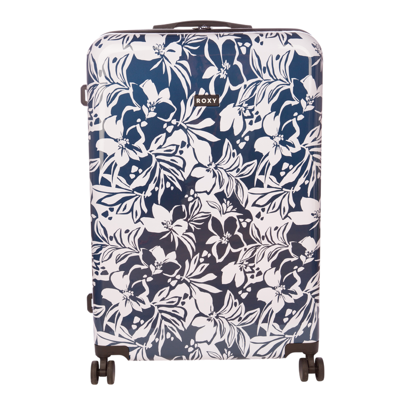 The Roxy Up And Away Hardside Spinner Large Luggage in Oceanside features a blue and white floral pattern, four spinner wheels, an adjustable handle, and a durable PC/ABS shell for enhanced protection. The expandable design prominently displays the Roxy brand near the top center.