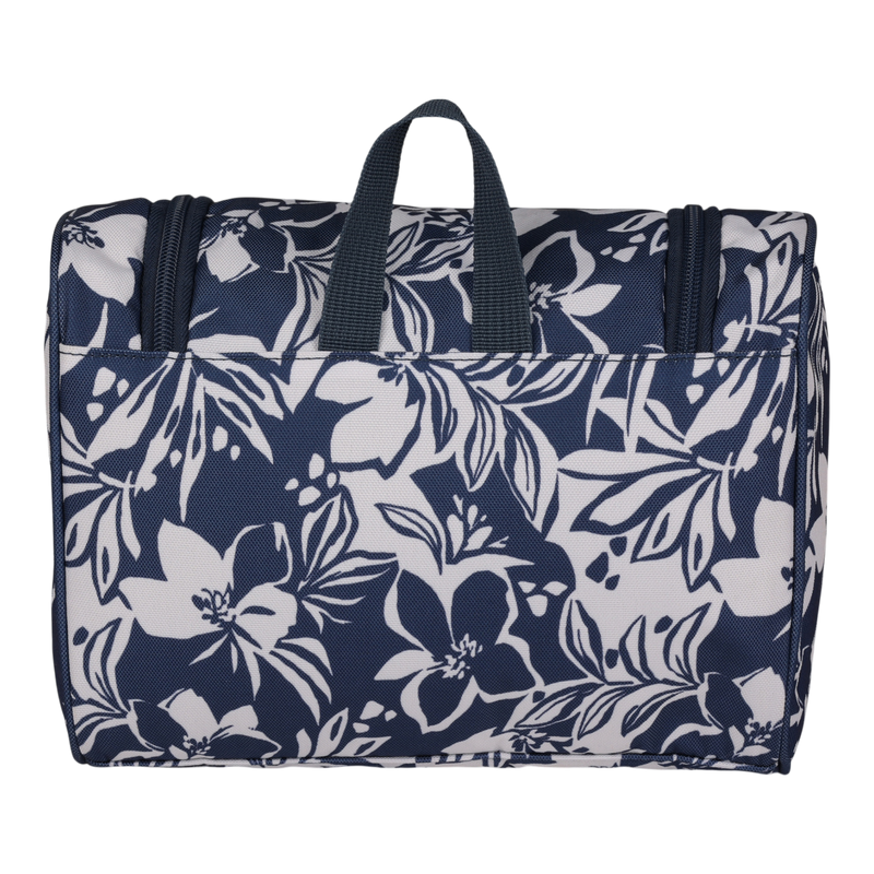 The Roxy Travel Dance Toiletry Kit is a navy blue storage bag adorned with white floral patterns, crafted from recycled polyester and designed with two short handles on top, shown against a plain white background.
