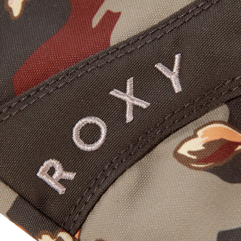 Close-up of a fabric featuring a camouflage pattern with the brand name Roxy stitched in white thread on a black strip, highlighting the stylish design seen on the Roxy Jetty Mitts.
