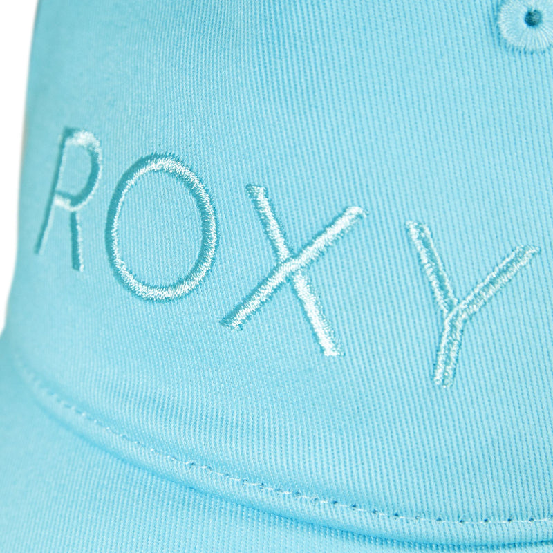 Close-up of the Dear Believer Baseball Cap, a light blue cotton twill cap with “ROXY” embroidered in white thread on the front, making it a stylish women’s baseball hat from Roxy.