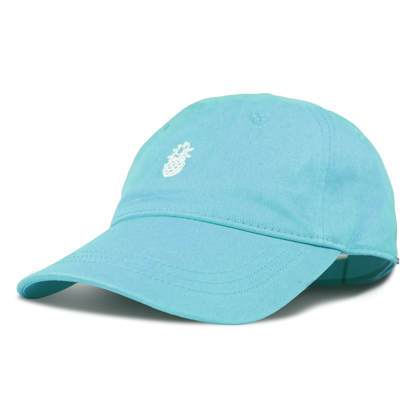 The Roxy Next Level Cap is a turquoise women’s cotton twill baseball hat featuring a small white embroidered pineapple on the front and a classic curved visor, shown against a white background.